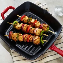 GRILL RAYADO HIERRO FUNDIDO ESMALTADO 27 CM 2,3L ROJO TRAMONTINA 31700211